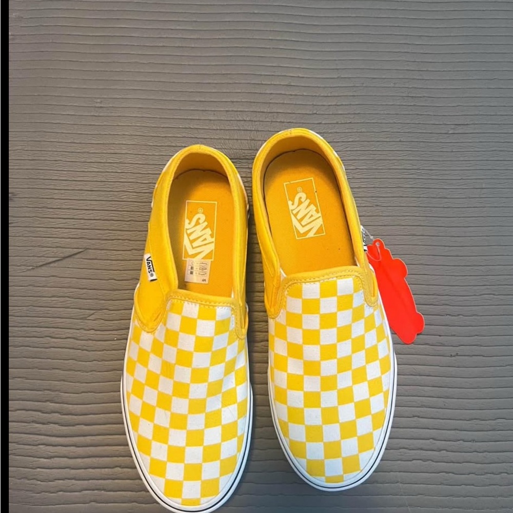 Vans women’s Yellow Checkered Slip-On Shoes